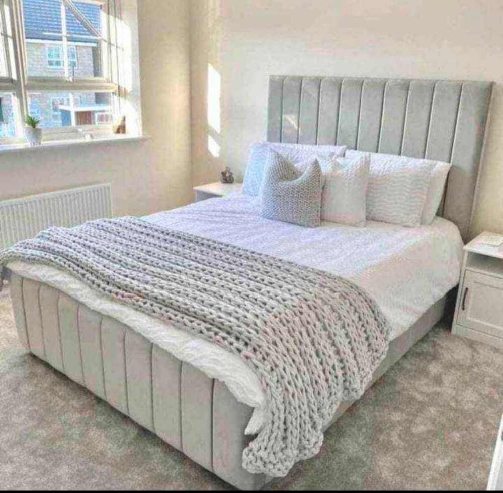 Panel line headboard with slatted base and optional storage